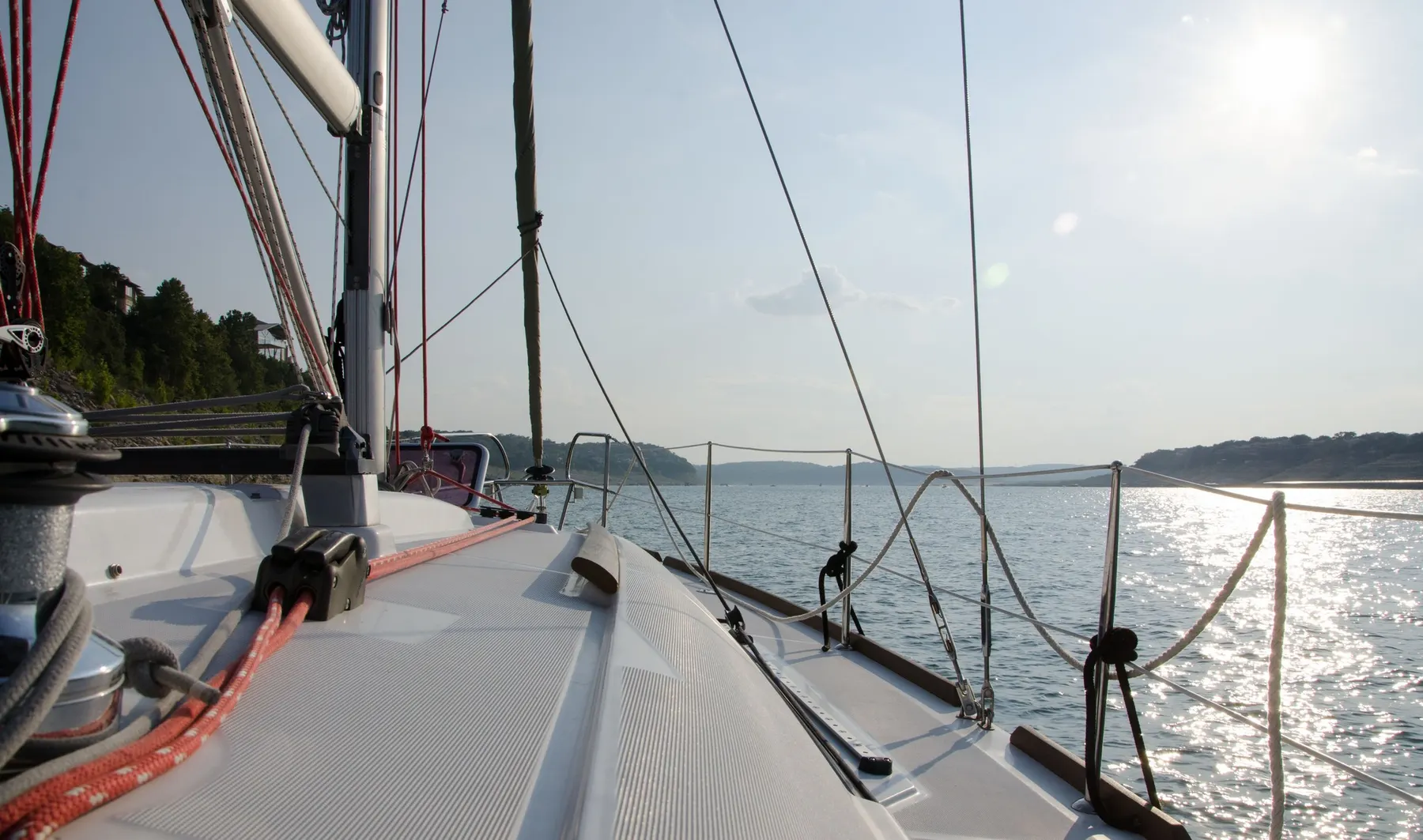 Sailboat anchored in a quiet cove on Lake Travis